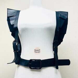 Black leather shoulder harness belt with ruffle detail and adjustable straps